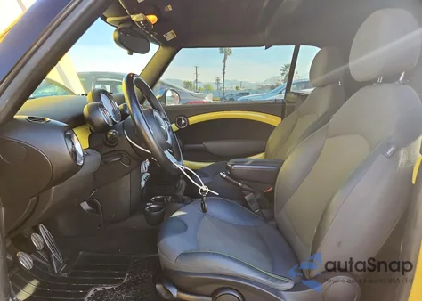 2009 Mini Cooper S z USA, uszkodzony, nr VIN WMWMS33579TG88062